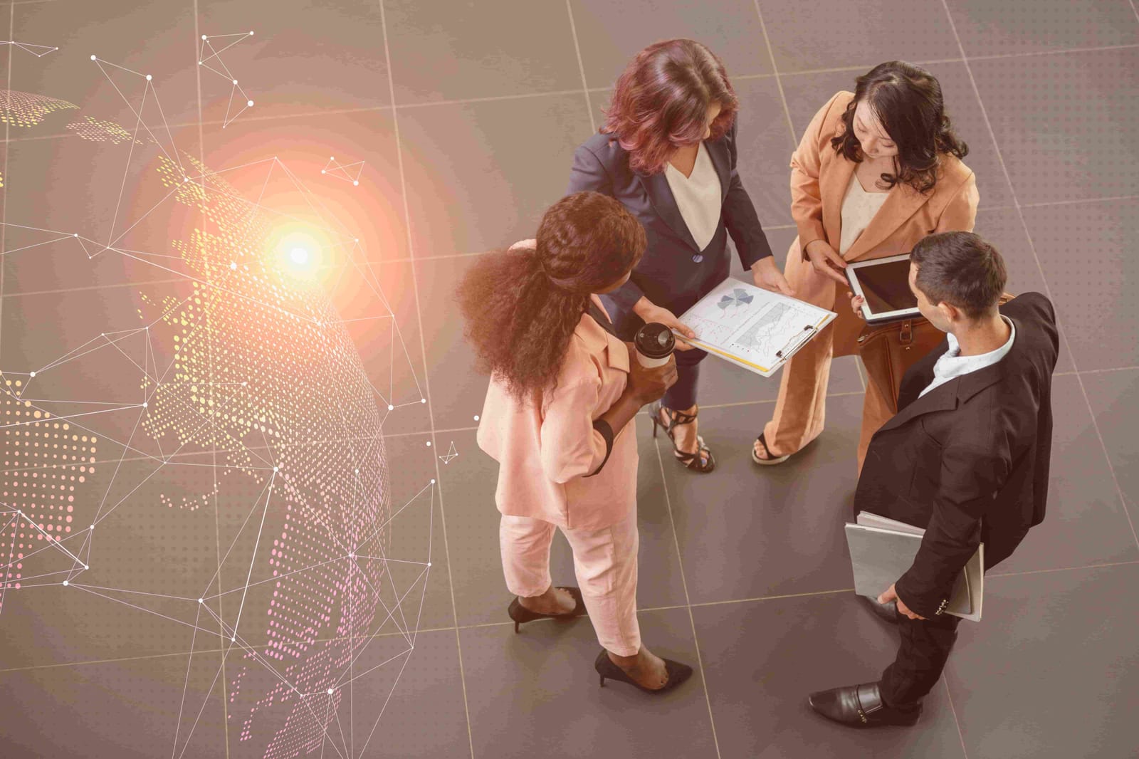 Team meeting around a table over a world map of network connections